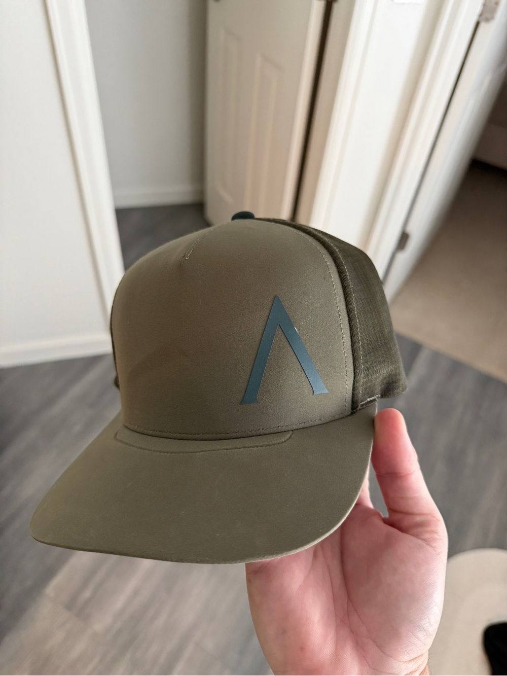 Arc'teryx Olive Green Trucker Hat with Subtle Reflective Logo